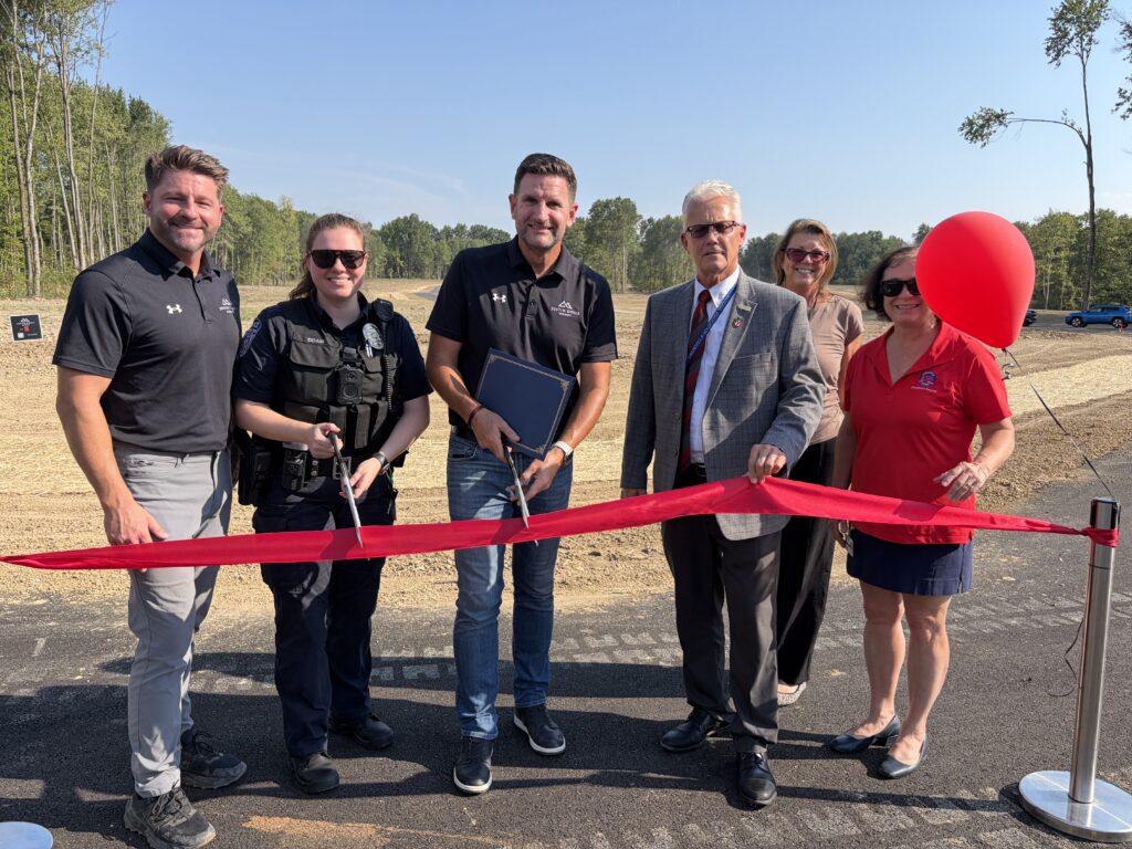 Justin Doyle and Clermont County officials cut the ribbon at the Oakridge Estates grand opening in Goshen Township, Ohio