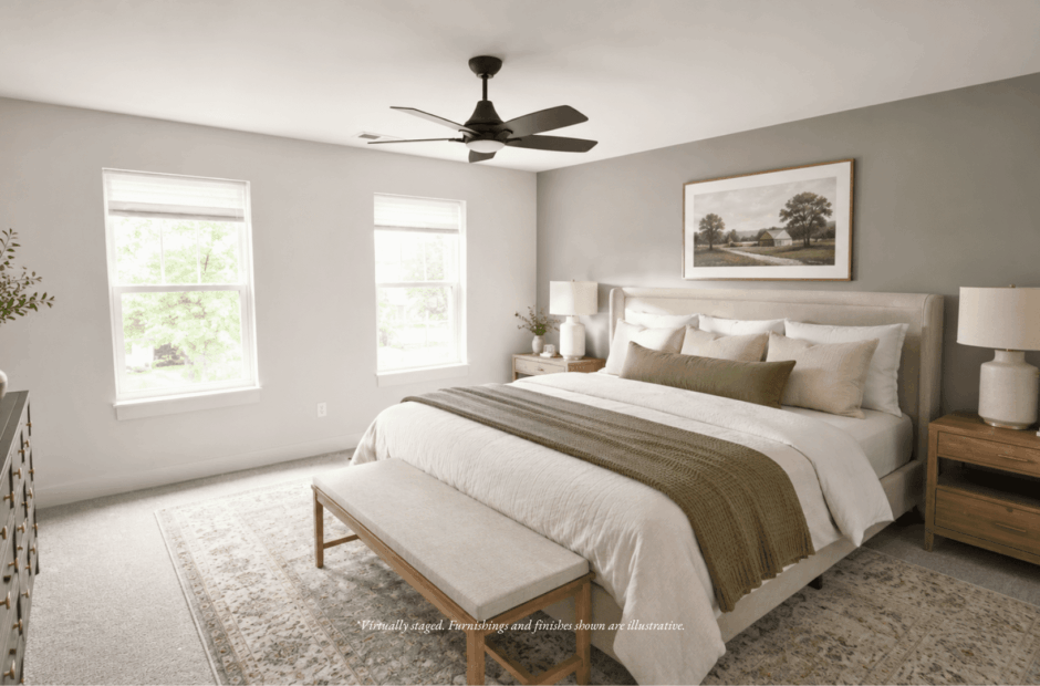 Primary bedroom in a Lebanon Landing 3 bedroom townhome with upholstered king bed, two windows, dual nightstands, and a neutral traditional palette.